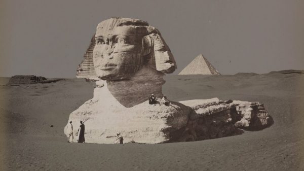 A rare image of the Great Sphinx buried beneath the sand. Shutterstock.