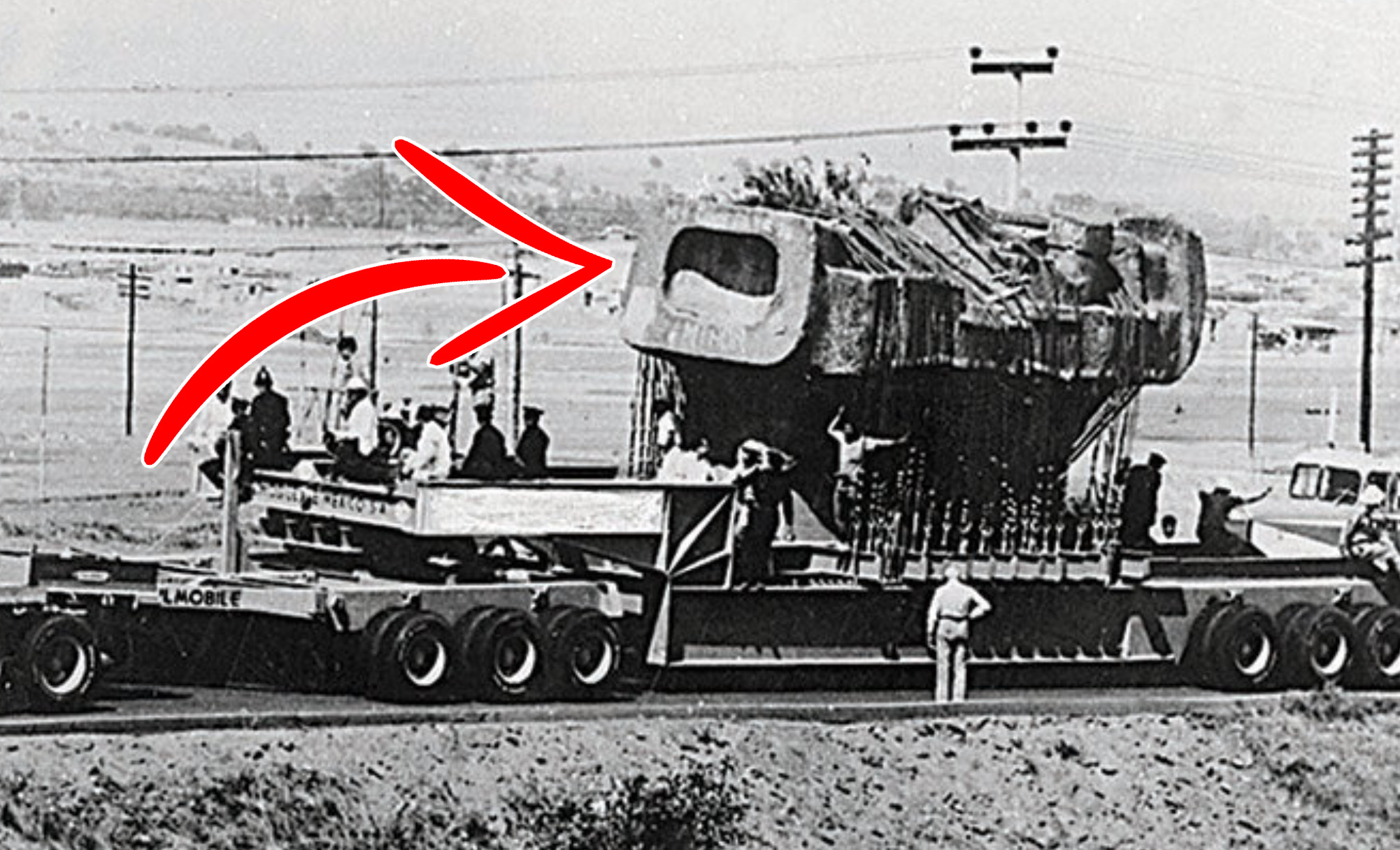 A photograph showing how the monolith of Tlaloc was transported in modern times.