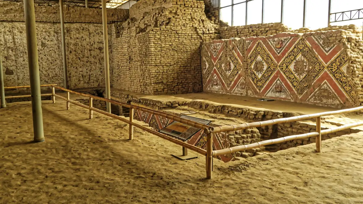 Painted Moche relief panels preserved inside Huaca de la Luna near Trujillo, Peru.