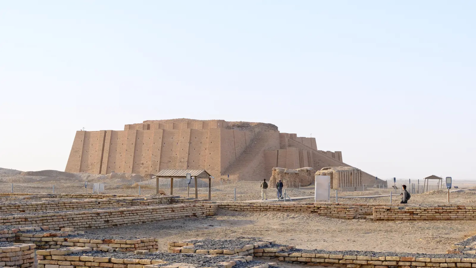 Great Ziggurat of Ur rising behind excavated mud-brick structures in southern Iraq.